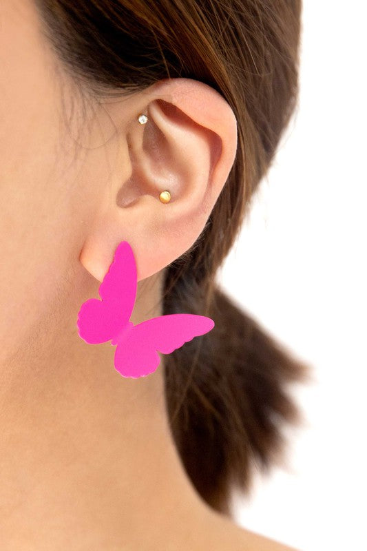 Flutter Post Earrings in a gradient from yellow to pink arranged in a diagonal line on a white background.