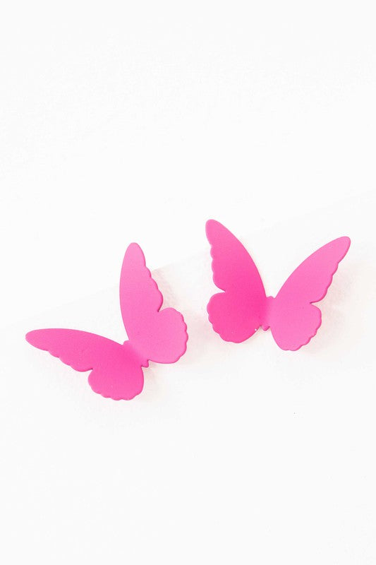 Flutter Post Earrings in a gradient from yellow to pink arranged in a diagonal line on a white background.