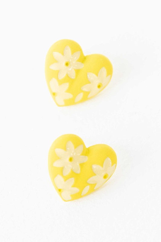 A diagonal line of Flower Lover Stud Earrings with floral patterns on a white background, featuring yellow stud hearts with Sterling Silver Posts.