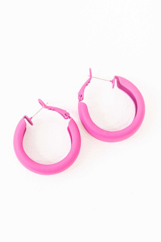 Two pairs of Eclectic Hoop Earrings, one neon pink and one yellow, against a white background.