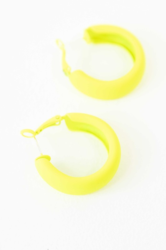 Two pairs of Eclectic Hoop Earrings, one neon pink and one yellow, against a white background.