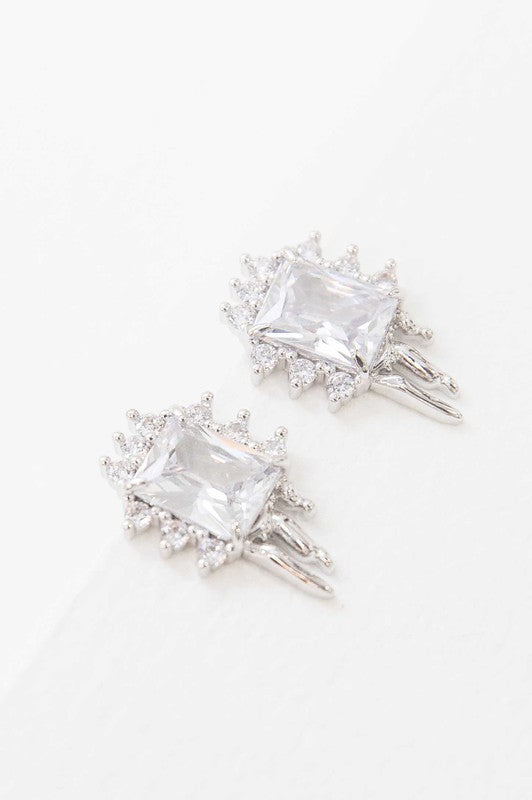 A pair of intricate crystal Drip Stud Earrings on a white background, featuring sterling silver posts.