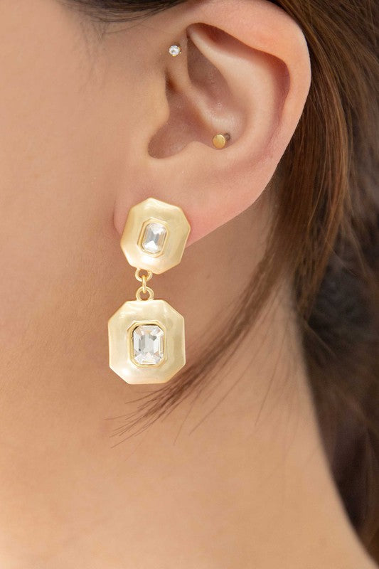 Avant Drop Earrings with clear rectangular gemstone accents.