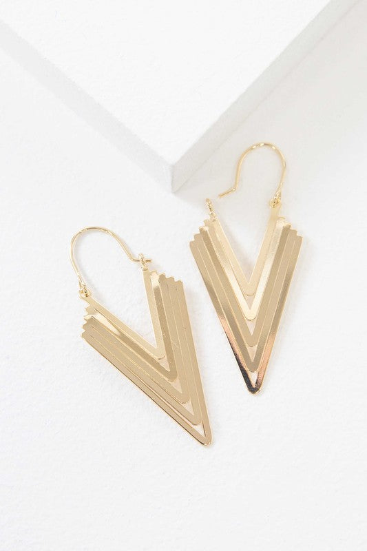 Sentence with product name: Gold-toned, geometric Athena Hook Earrings displayed against a white background with 14k gold plating.