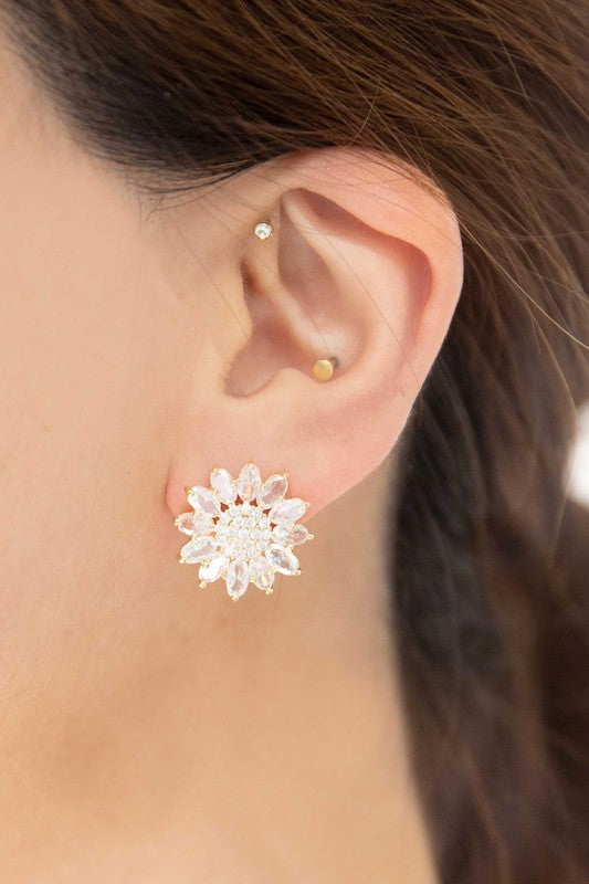 Pair of Aurora Stud Earrings with gemstone embellishments on a white background.