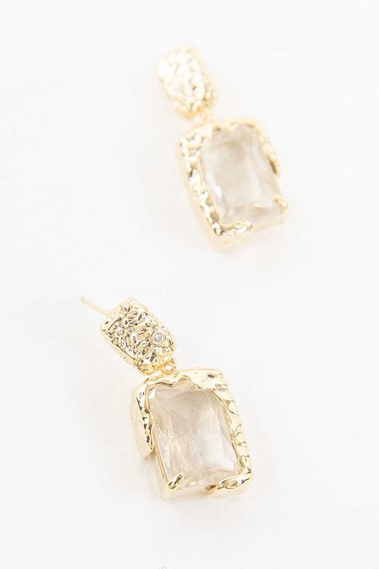 Molten Drop Earrings with clear rectangular gemstones in a formal style.