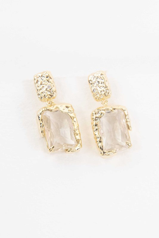 Molten Drop Earrings with clear rectangular gemstones in a formal style.