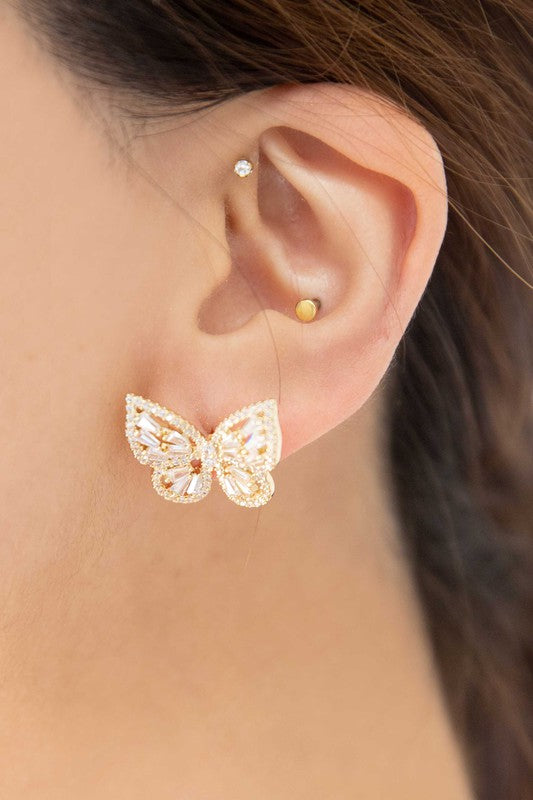 Sentence with product name: A pair of Crystal Butterfly Earrings Gold adorned with sparkling stones and a sterling silver post.