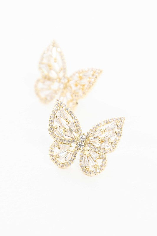 Sentence with product name: A pair of Crystal Butterfly Earrings Gold adorned with sparkling stones and a sterling silver post.
