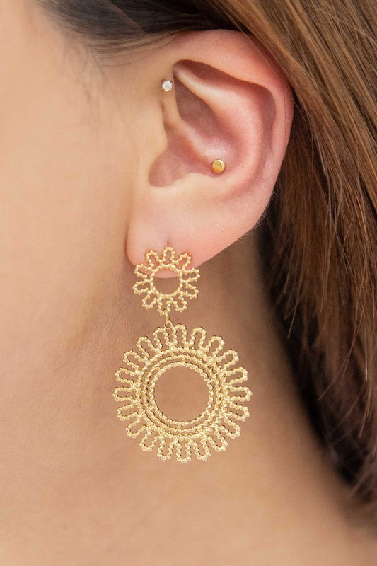 A pair of intricate Lace Flower Drop Earrings with a floral lace design displayed against a white background.