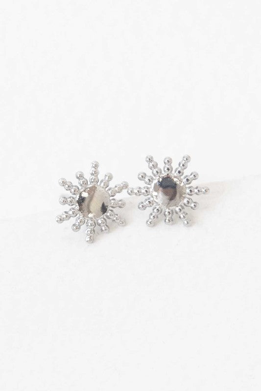 Pair of Sunnyside stud earrings with 14k gold plating on a white background.