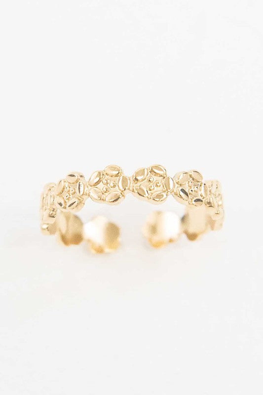 Blossom Ear Cuff Earrings on a white background.