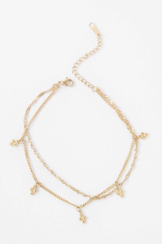 Double-layered Bon Bon Anklet with 14k gold plating and butterfly charms.
