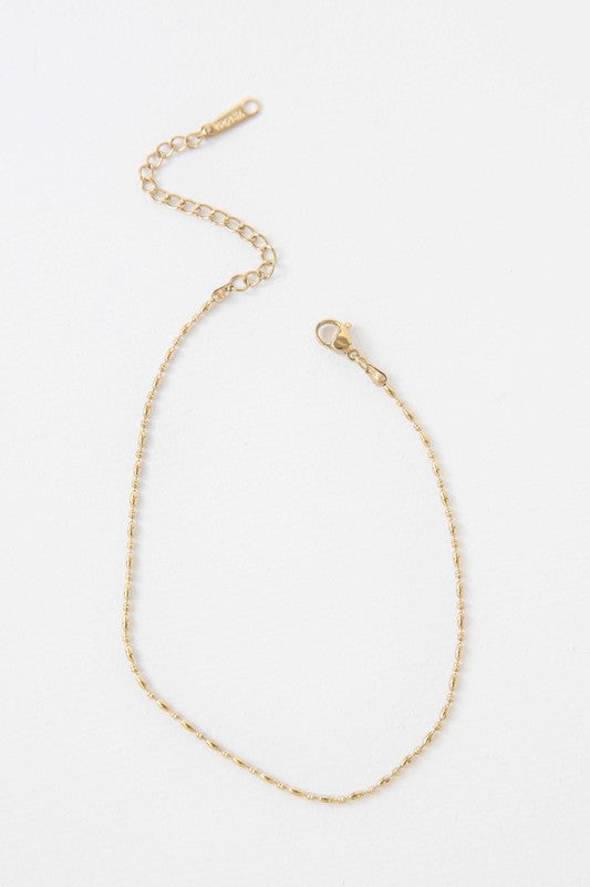 Mini Gold Bead Anklet on a white background.