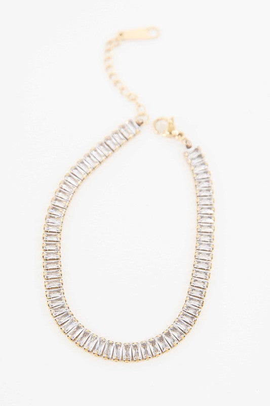 Baguette Stone Tennis Bracelet with baguette crystals on a white background.