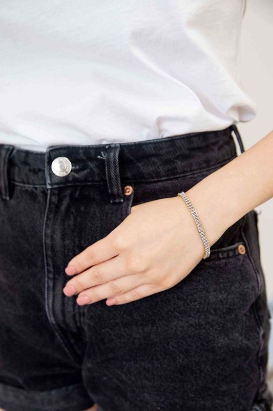 Baguette Stone Tennis Bracelet with baguette crystals on a white background.