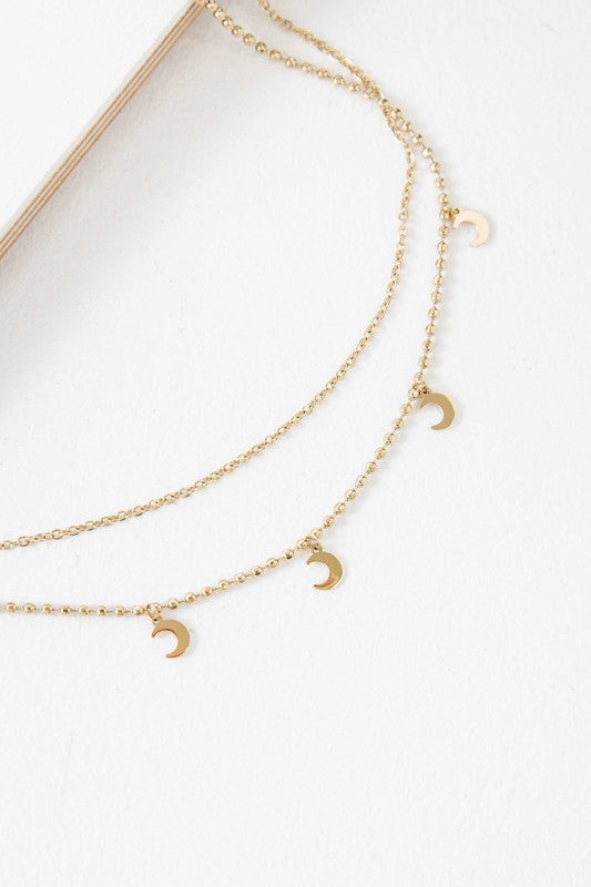 La Lune Layered Necklace with delicate chains and small crescent moon charms.
