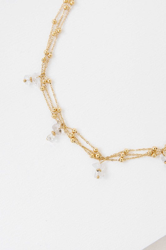 Aura Stone necklace with bead accents, featuring 14k gold plating displayed on a white background.