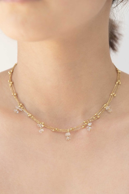 Aura Stone necklace with bead accents, featuring 14k gold plating displayed on a white background.