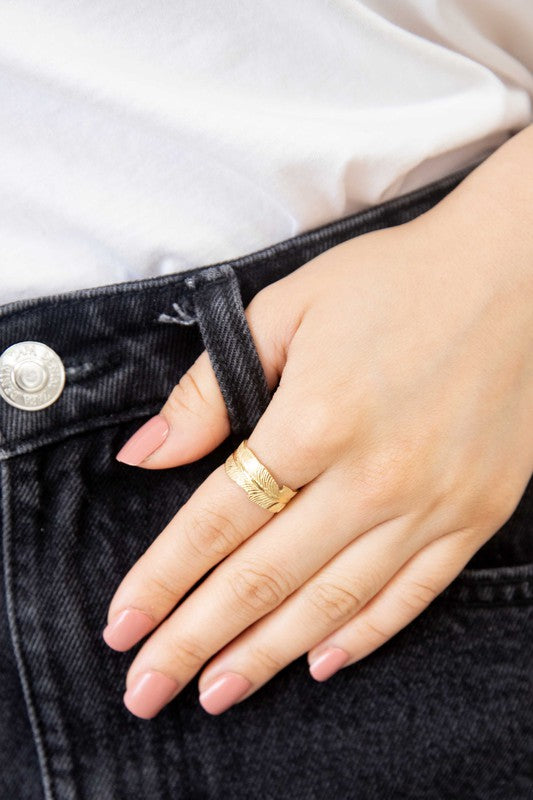 Feather Adjustable Ring with 14k gold plating on a white background.
