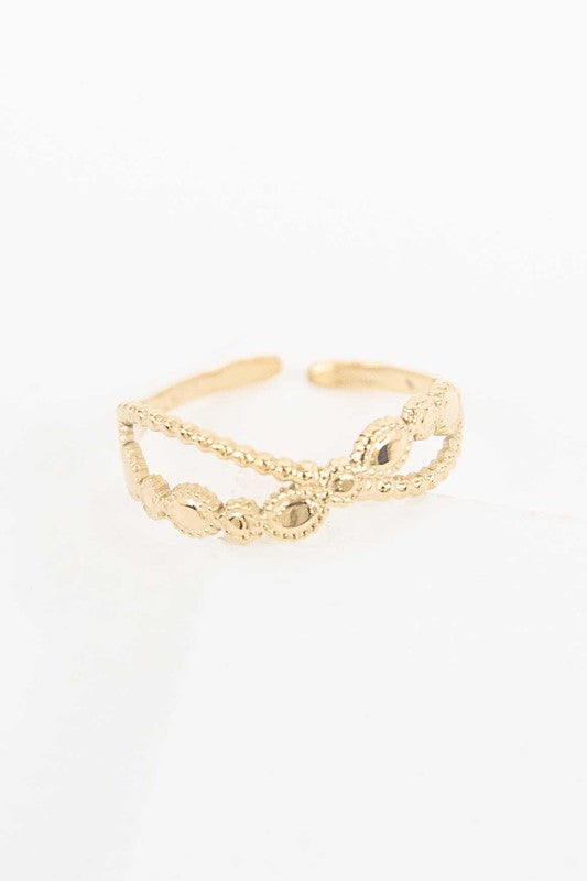 Infinity Adjustable Ring with 14k Gold Plating on a white background.