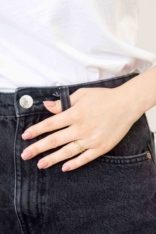 Infinity Adjustable Ring with 14k Gold Plating on a white background.