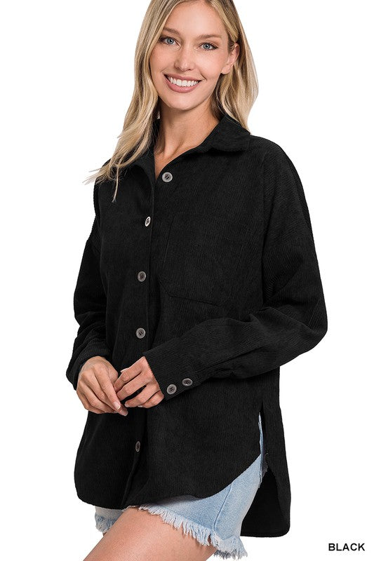 A woman smiling and wearing the Oversize Corduroy Shacket in teal over a white top, perfect for casual outings in your fall and winter wardrobe.