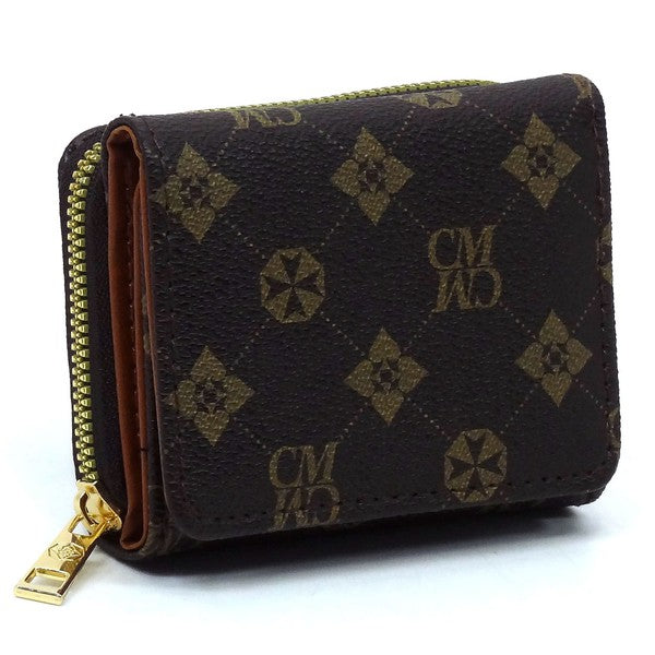 A CM Monogram Tri-fold Wallet, crafted from vegan leather, featuring a black design with a gold zipper and intricate geometric patterns, including star shapes and "CM" monogram lettering.