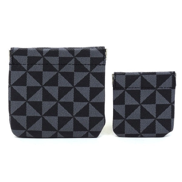 The PM Monogram Spring Zip 2-in-1 Coin Purse includes two fabric bags, one larger and one smaller, adorned with a black and white geometric triangle pattern. These bags feature a convenient spring zip closure and gold-tone hardware for an elegant finish.