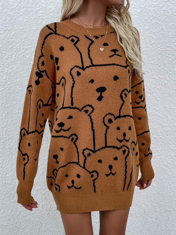 A person wearing a Womens Long Sleeve Round Neck Pullover Sweater adorned with multiple bear faces stands against a white textured wall.