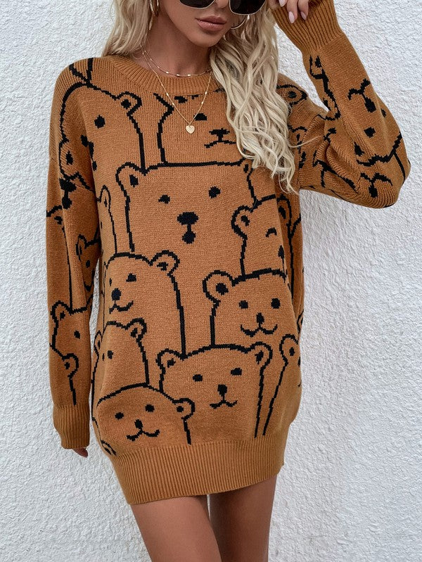 A person wearing a Womens Long Sleeve Round Neck Pullover Sweater adorned with multiple bear faces stands against a white textured wall.