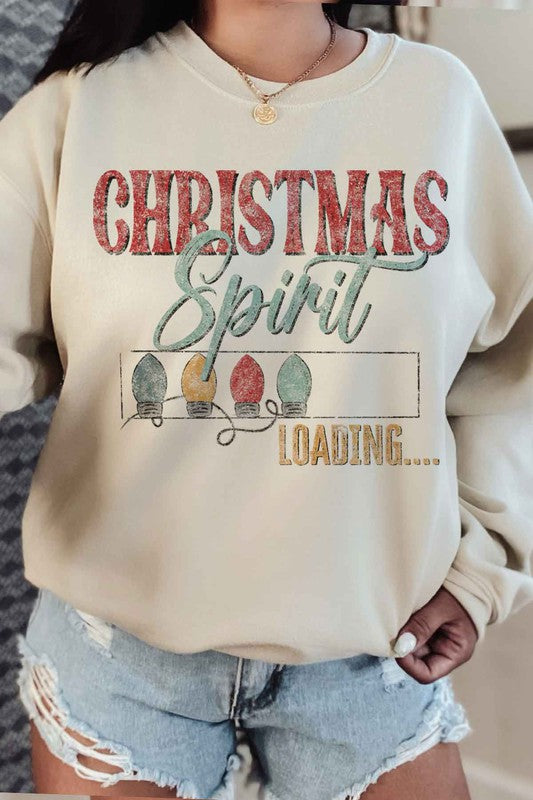 Person wearing the Loading Christmas Spirit Graphic Sweatshirt, featuring the text "Christmas Spirit Loading..." and colorful Christmas lights, perfect for your holiday wardrobe. Unisex sizing ensures a comfortable fit for everyone.