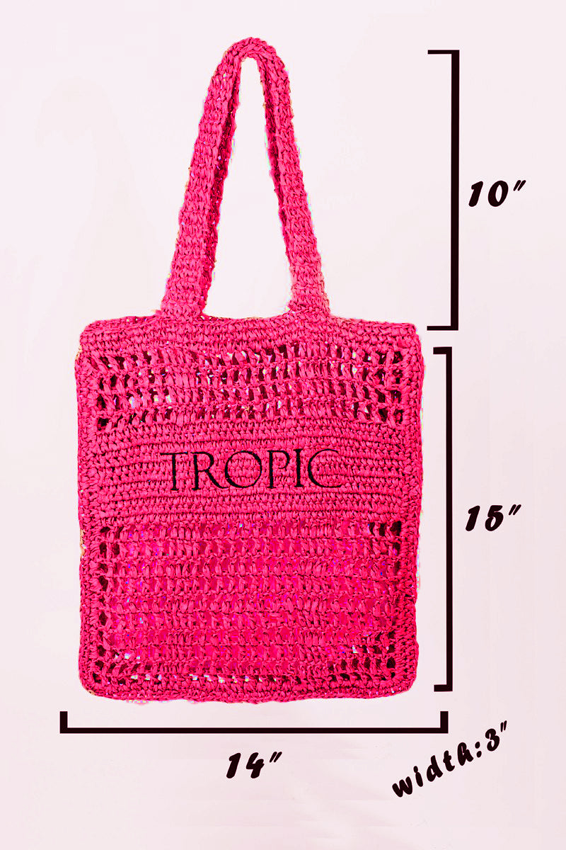 Introducing the Fame Cutout Letter Graphic Handbag, a trendy accessory that showcases a modern design with the word "TROPIC" in bold black lettering on its pink woven surface.