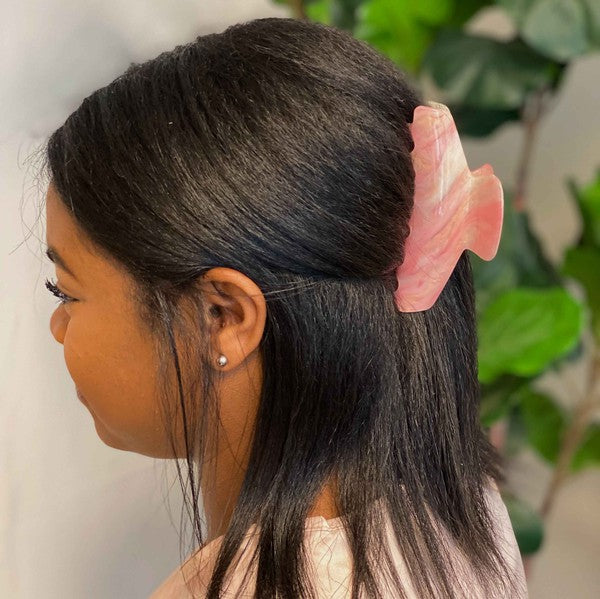 Two oversized capacity, Art Of Colors Hair Claw hair clips on a white background.