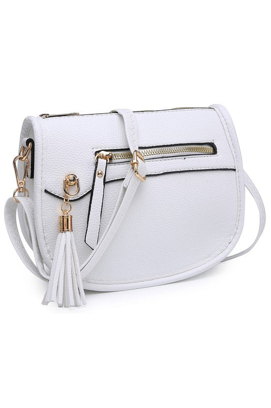 The Fashion Saddle Crossbody Bag in lavender faux vegan leather features a gold zipper, front pocket, tassel detail, and an adjustable shoulder strap.