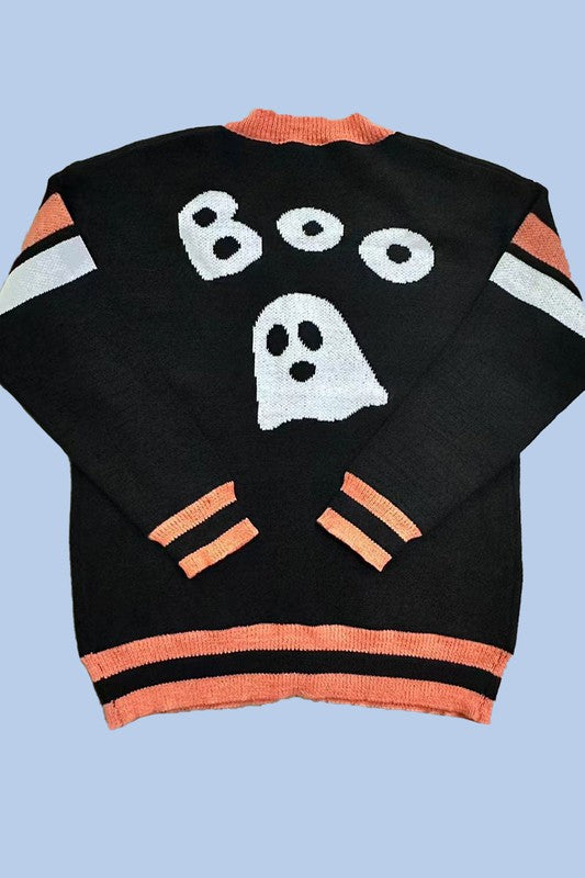 Front and back view of the "Ghost Cardigan," a button-front black cardigan with orange trim, featuring a ghost design on the front pocket and "Boo" with a ghost on the back. This exclusive in-house design is available in plus sizing for the perfect fit.