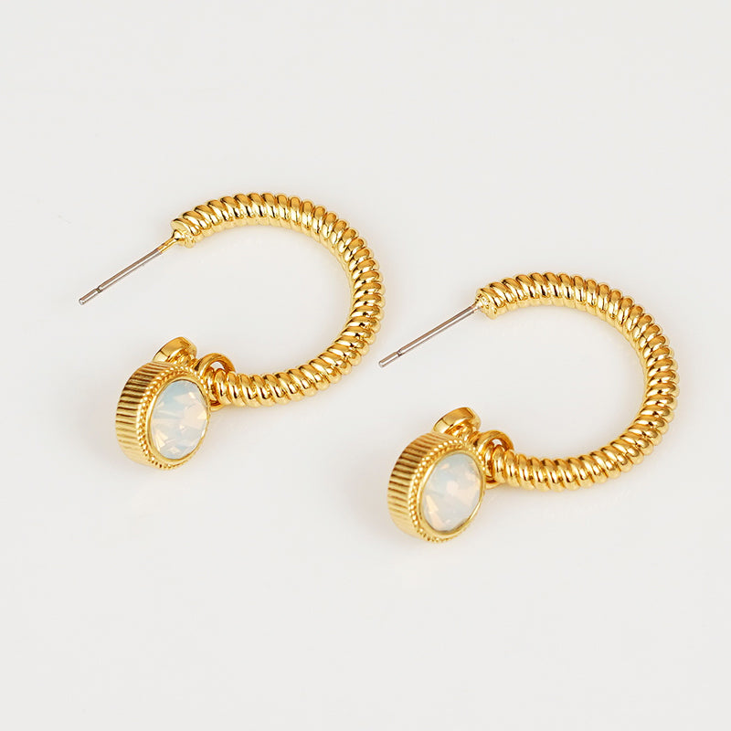 Introducing the Rope Cat's Eye Stone C-Hoop Earrings, featuring a gold-plated coiled design adorned with cat's eye gemstones near the clasps, set against a plain white background.