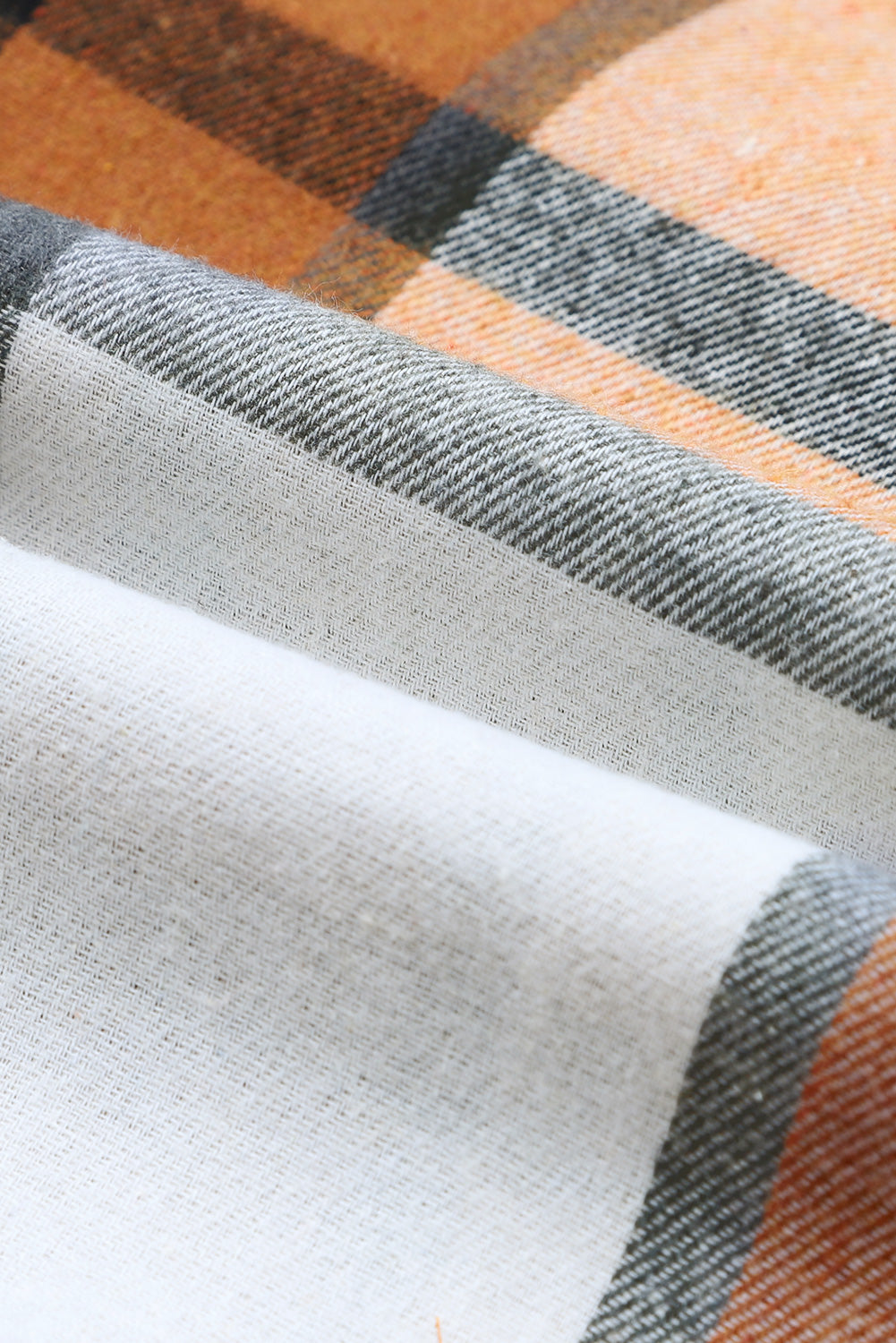 A woman wearing a Khaki Plaid Pattern Collared Neck Ruffled Sleeve Shirt Dress.