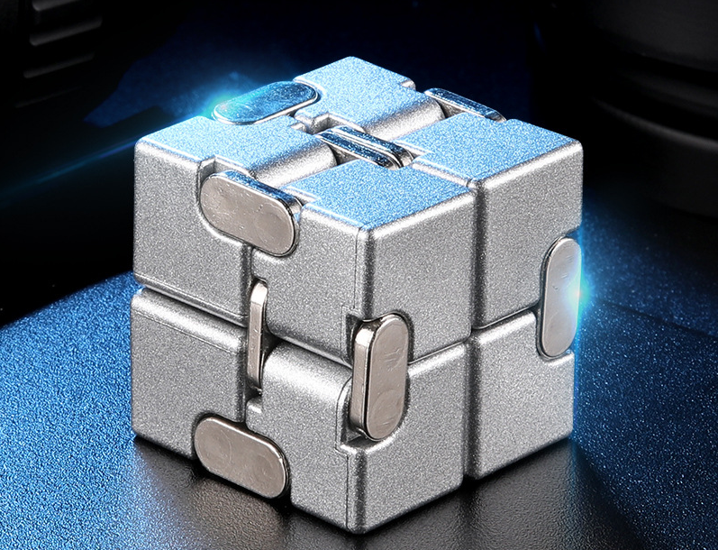 The Metal Infinitive Cube is a stress relief gadget featuring a sleek metallic design and small interconnected blocks that offer endless entertainment and relaxation.