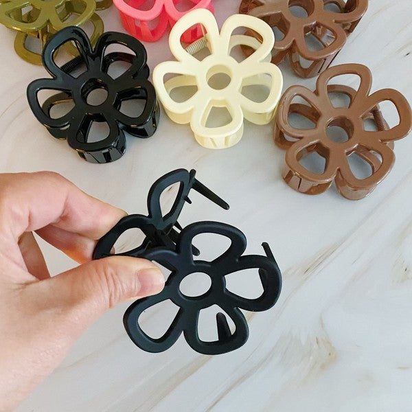 Anemone Flower Hair Claw Set Of 3 arranged on a light background.