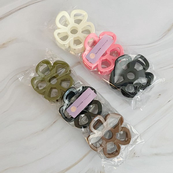 Anemone Flower Hair Claw Set Of 3 arranged on a light background.