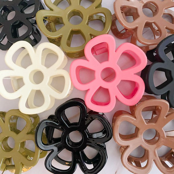 Anemone Flower Hair Claw Set Of 3 arranged on a light background.