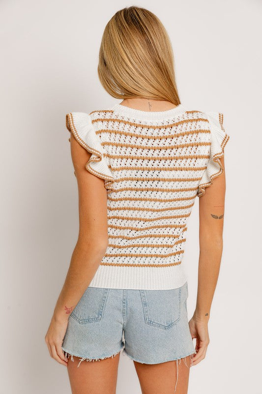 A woman is wearing a Round Neck Ruffle Sleeve Stripe Knit Top in a chic print, sleeveless white and brown stripe design, paired with light blue denim shorts, standing against a plain background.