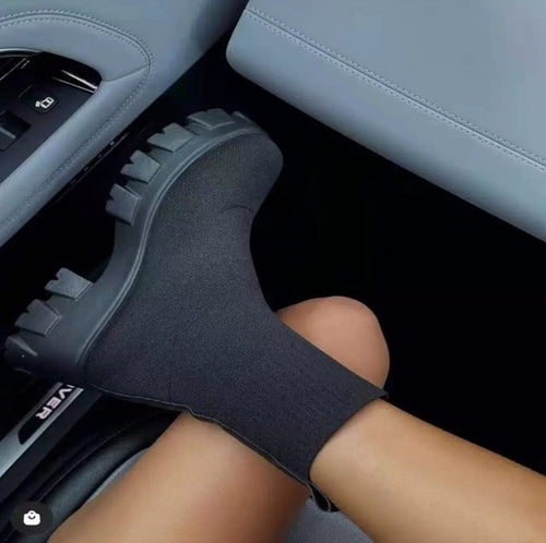 A pair of black, chunky-soled 2023 Autumn Winter Couple Shoes Women Thick Soled Casual Large Size slip-on ankle boots on a plain white background.