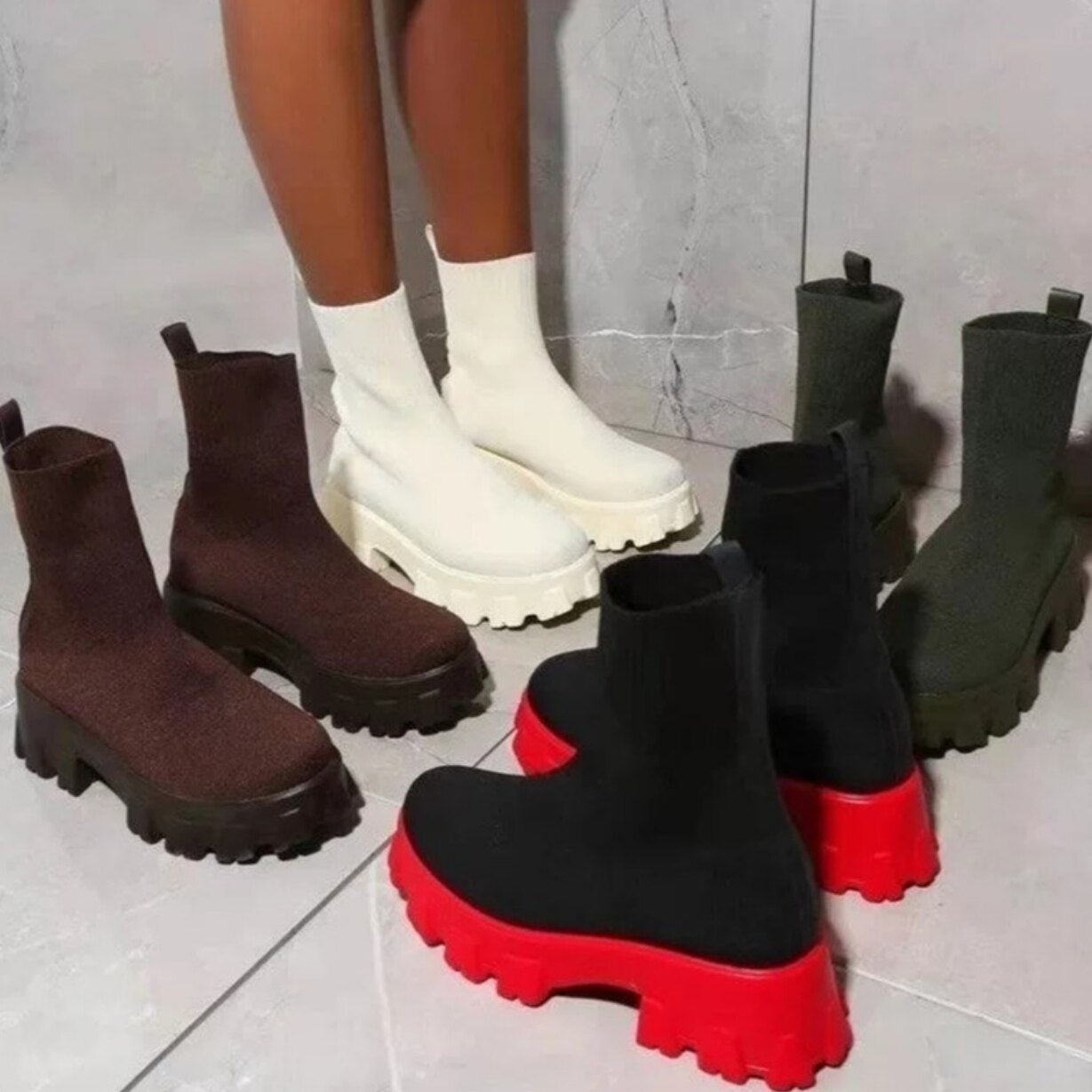 A pair of black, chunky-soled 2023 Autumn Winter Couple Shoes Women Thick Soled Casual Large Size slip-on ankle boots on a plain white background.