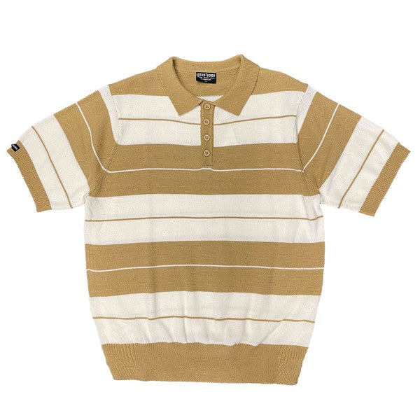 The Charlie Brown Shirt Short Sleeve Polo is a short-sleeve, polo-style shirt adorned with horizontal blue and light blue stripes. It features a buttoned collar, ribbed hem, and sleeve cuffs. Made from 100% acrylic, this design adds a touch of 1950s nostalgia to your wardrobe, reminiscent of classic Charlie Brown polos.