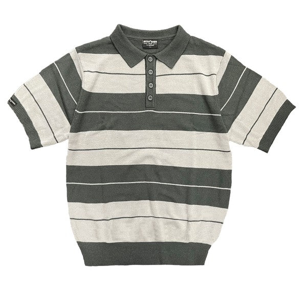 The Charlie Brown Shirt Short Sleeve Polo is a short-sleeve, polo-style shirt adorned with horizontal blue and light blue stripes. It features a buttoned collar, ribbed hem, and sleeve cuffs. Made from 100% acrylic, this design adds a touch of 1950s nostalgia to your wardrobe, reminiscent of classic Charlie Brown polos.