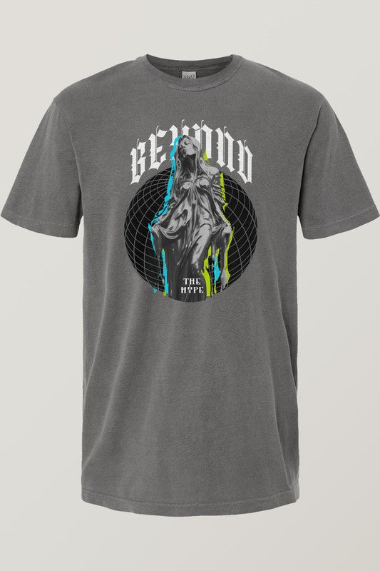 Urban Street Wear's Vintage Garment Dye Tee features a gray color with a vintage wash, showcasing a graphic of a robed figure embellished with paint splatters. The design is framed by the words "B2GOD THE HYPE" above and below an eye-catching geometric background, creating an unmistakable streetwear vibe.