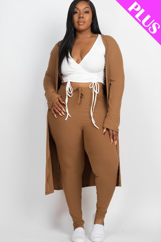 A woman wears a Plus Size Ribbed Long Cardigan & Leggings Set in beige with a white wrap top. The image features a "PLUS" label in the upper right corner.