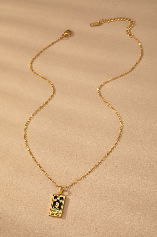 Five gold rectangular waterproof Tarot Card Natural Stone Necklaces featuring designs labeled "The Star," "The Moon," "The Sun," and "The Lovers," displayed against a beige backdrop. These exquisite necklaces include a durable PVD coating, ensuring their brilliance lasts through every wear.
